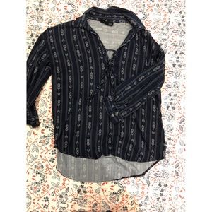 Dark blue top with white arrows